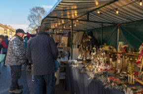 Market stall at a Christmas market on a Go Cotswolds Christmas tour.