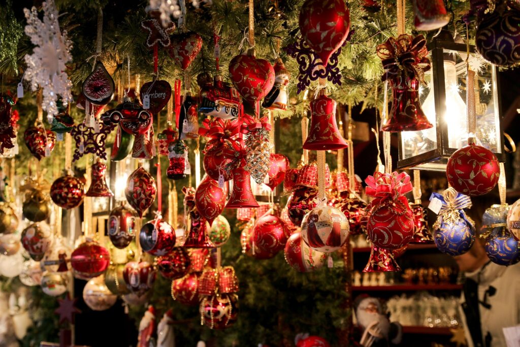 Christmas stall selling Christmas decoartions on a Go Cotswolds Castle Combe and Bath Christmas Market Tour.